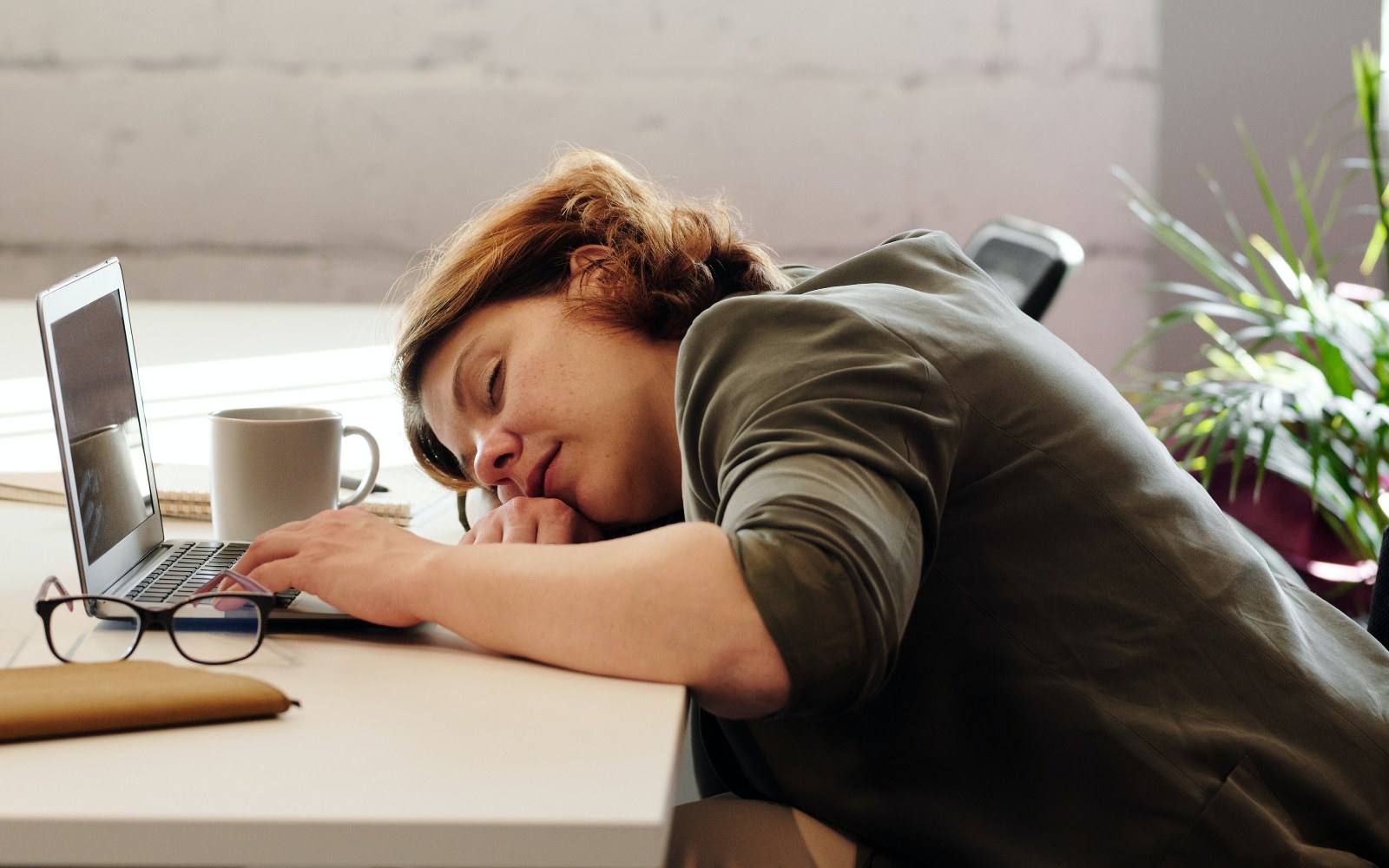 Adult asleep at desk